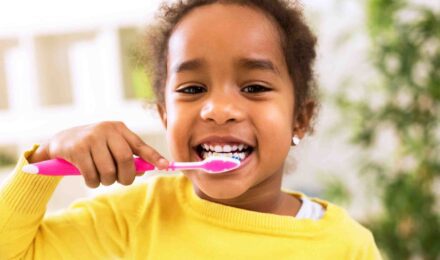 protect kids teeth by brushing teeth